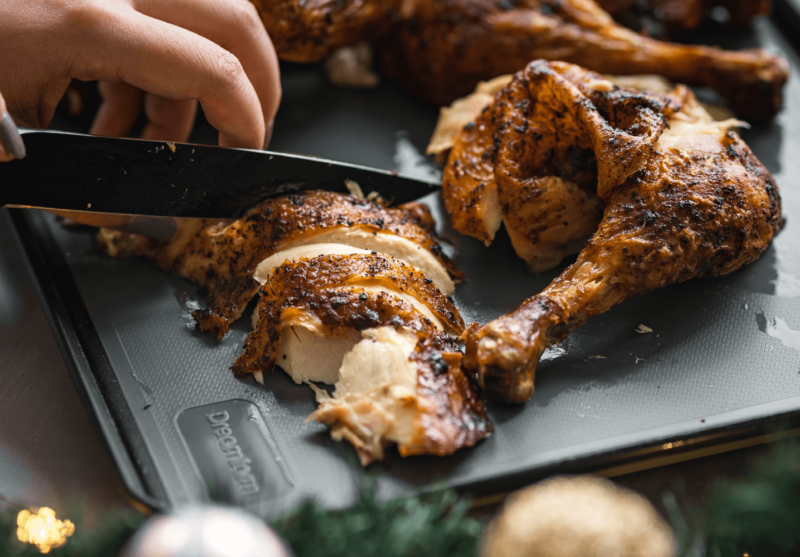 Non-slip cutting board with flip up edges